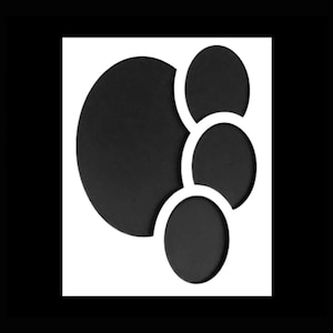 May include: A white background with four black circles of different sizes overlapping each other.