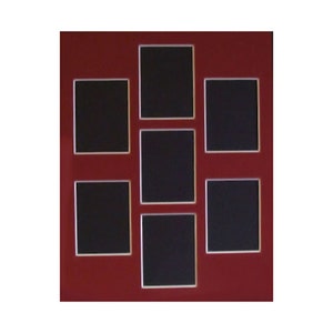 May include: A red picture frame with eight openings for photos. The openings are arranged in a grid pattern with a white border around each opening.