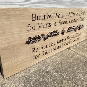 May include: A wooden sign with the text "Built by Wolsey Allen c. 1900 for Margaret Scott, Lisnamallard. Re-built by James Doyle, 2018 for Richard and Shirley Scott."