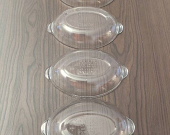 Pyrex 328 oval shaped clear glass casserole dishes set of four