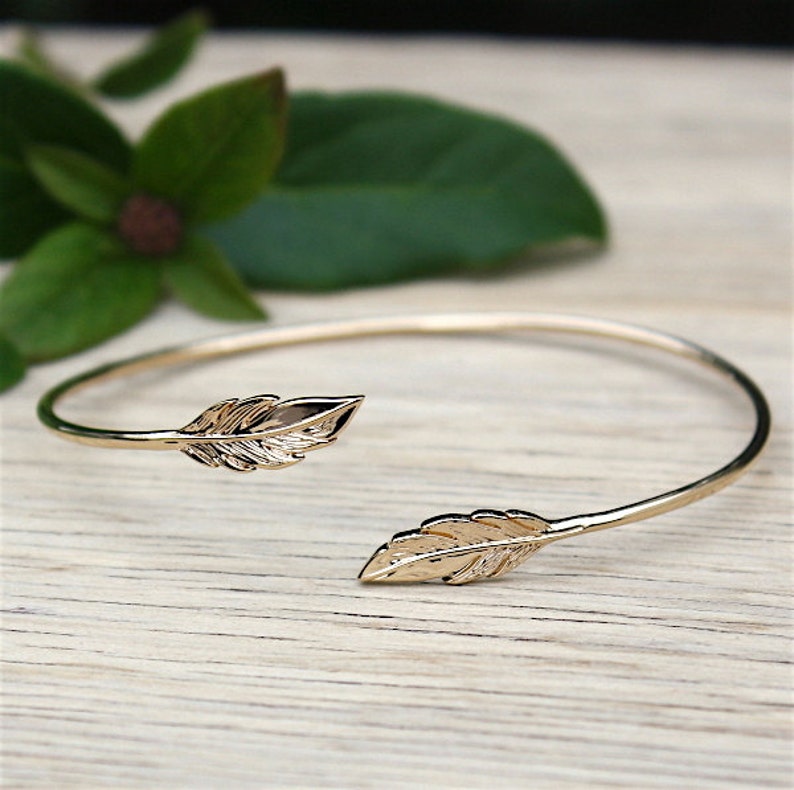 Bangle Bracelet gold plated feather 750 thousandth