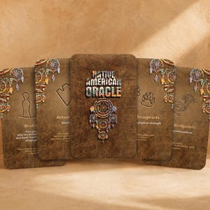 May include: A set of five rectangular oracle cards with a textured brown background. The center card displays the text Native American Oracle above a dreamcatcher graphic. Other cards feature symbols like bear prints, arrows, and bird prints.