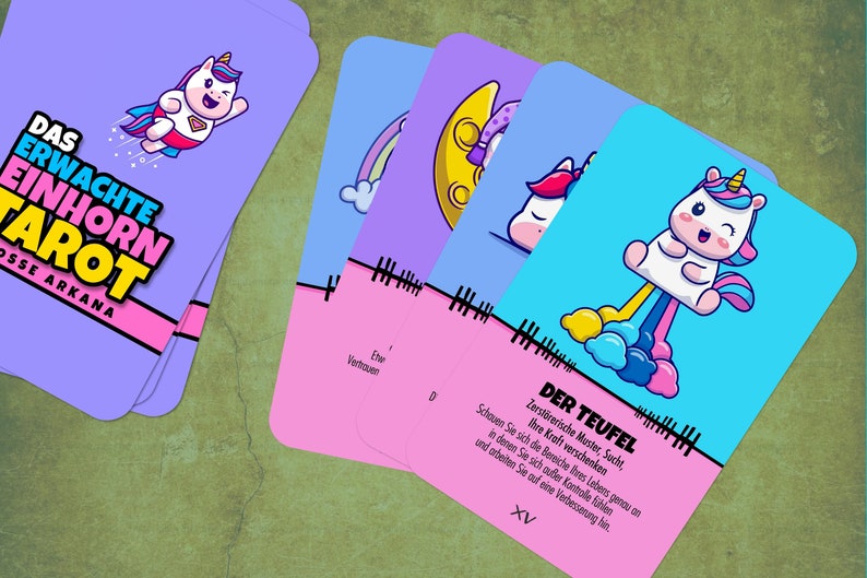 May include: A set of tarot cards with a unicorn theme. The cards feature colorful illustrations of unicorns in various poses, including a unicorn flying, a unicorn sleeping, and a unicorn with a rainbow coming out of its rear end. The cards are labeled with the names of the tarot cards, such as "The Devil" and "The Star".