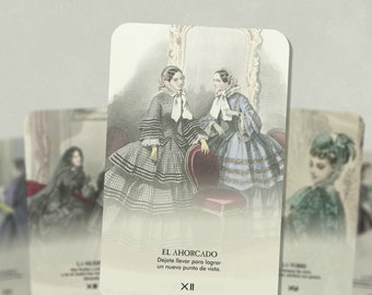 May include: A vintage tarot card with a black and white checkered design. The card depicts two women in 19th-century clothing. The card is titled "El Ahorcado" and has the number XII on it. The text on the card reads "Dejate llevar para lograr un nuevo punto de vista."
