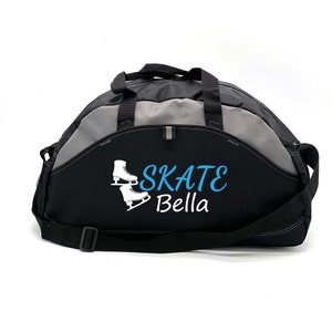 May include: Black and gray duffel bag with a white ice skate graphic and the text "SKATE Bella" in blue.