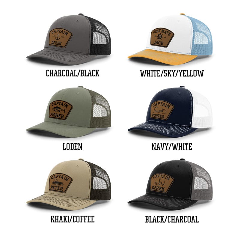 May include: A collection of six trucker hats in various color combinations, each featuring a leather patch with nautical-themed designs and the word "CAPTAIN" or "FIRST MATE" along with a name. The hats include charcoal/black, white/sky/yellow, loden, navy/white, khaki/coffee, and black/charcoal.