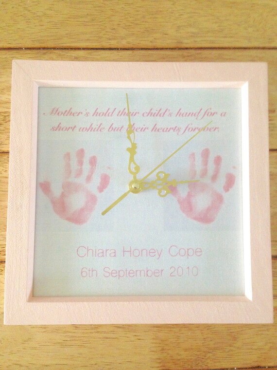 Items similar to Baby hand print clock, baby hand print gift