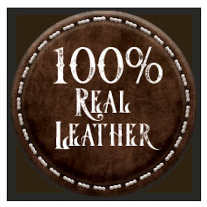 May include: A brown leather patch with white stitching around the edge. The text "100% REAL LEATHER" is printed in white on the patch.