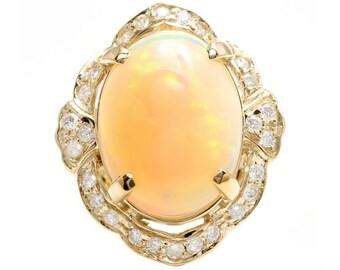 13.70ct natuurlijke Ethiopische opaal en diamant 14k massief geelgouden ring