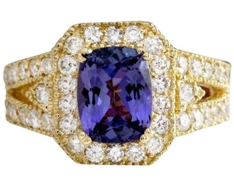 3.30 Carats Natural Tanzanite and Diamond 14k Solid Yellow Gold Ring