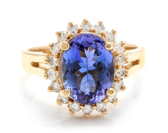 4.10 Carats Natural Tanzanite and Diamond 14k Solid Yellow Gold Ring