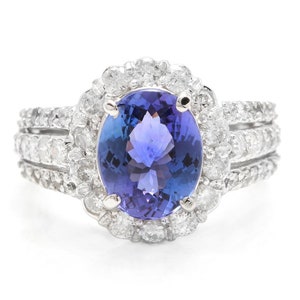 4.50 Carats Natural Tanzanite and Diamond 18k Solid White Gold Ring