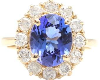 4.15 Carats Natural Very Nice Looking Tanzanite and Diamond 14K Solid Yellow Gold Ring