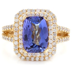 5.50 Carats Natural Tanzanite and Diamond 14k Solid Yellow Gold Ring