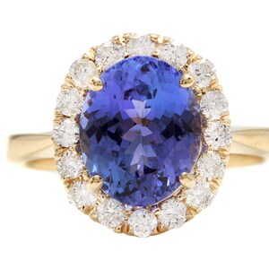 3.70 Carats Natural Tanzanite and Diamond 14K Solid Yellow Gold Ring