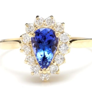 2.55 Carats Natural Tanzanite and Diamond 14k Solid Yellow Gold Ring