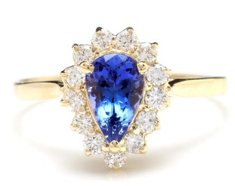 2.55 Carats Natural Tanzanite and Diamond 14k Solid Yellow Gold Ring