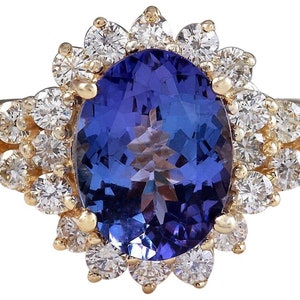 3.84 Carats Natural Tanzanite and Diamond 14k Solid Yellow Gold Ring
