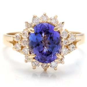 3.90 Carats Natural Tanzanite and Diamond 14k Solid Yellow Gold Ring