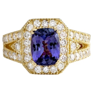 3.30 Carats Natural Tanzanite and Diamond 18K Solid White Gold Ring