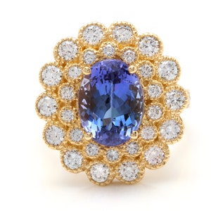 5.50 Carats Natural Tanzanite and Diamond 14k Solid Yellow Gold Ring