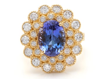 5.50 Carats Natural Tanzanite and Diamond 14k Solid Yellow Gold Ring
