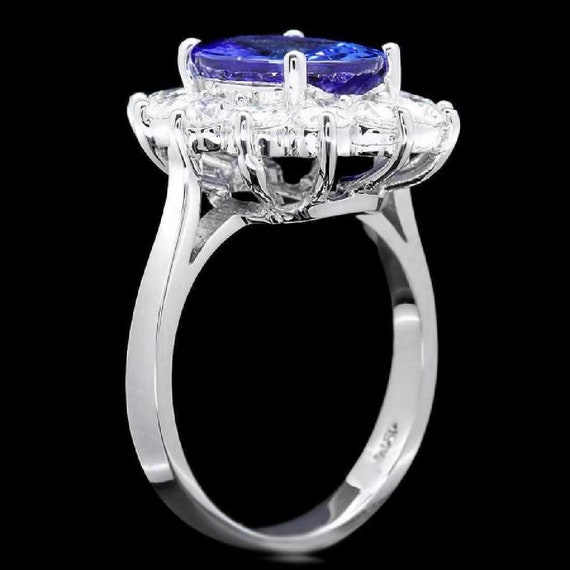 5.50 カラットの天然タンザナイトとダイヤモンドの 14k ソリッド
