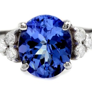 3.55 Carats Natural Tanzanite and Diamond 14k White Gold Ring