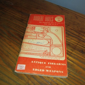 May include: A red and white catalog cover for Robert Abels Antique Firearms and Edged Weapons. The cover features a line drawing of a pistol and the text "Catalog No. 30".