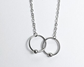 Feminist Fidget Necklace | Silver Stainless Steel Breast Pendant | Equality Symbol Jewellery