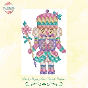 May include: A beaded nutcracker design in pink, teal, purple, and gold. The nutcracker wears a hat and holds a staff with a flower. The image includes the text "Brick, Peyote, Loom, Stitch Patterns".