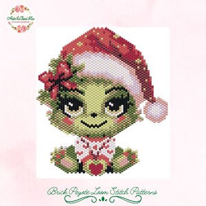 May include: A green, beaded Grinch-like character wearing a Santa hat and holding a red heart. The image is a brick peyote loom stitch pattern. The character has a red bow and is wearing a white and red shirt. The text "Brick Peyote Loom Stitch Patterns" is at the bottom.