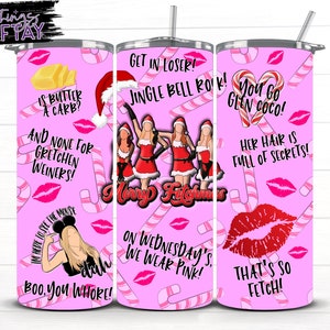 May include: Three pink and white tumbler cups with a Christmas theme and Mean Girls quotes. The quotes include "Get in loser! Jingle Bell Rock!" "You Go Glen Coco!" and "Is butter a carb? And none for Gretchen Wieners!"