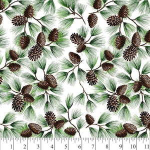 May include: White fabric with a repeating pattern of brown pine cones and green pine needles on branches. The design is a detailed illustration, suitable for various craft projects or home decor.