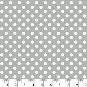 May include: A seamless pattern of white polka dots on a light gray background. The dots are evenly spaced and create a classic and timeless design.