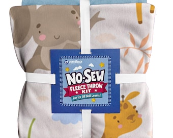 May include: A no-sew fleece throw kit featuring a light-colored fabric with a pattern of cartoon elephants and giraffes. The kit is secured with a white elastic band and includes a blue label with the text NO-SEW FLEECE THROW KIT.