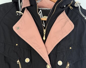 ASICS vintage black ski suit with removeable fur-lined hood and pops of pink