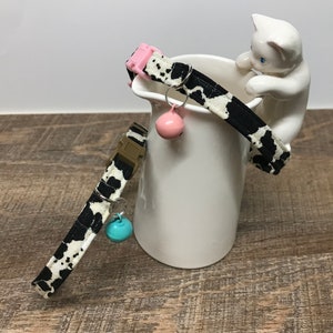 Moo Cow print cat collar with udder pink safety breakaway buckle and black bell + more options