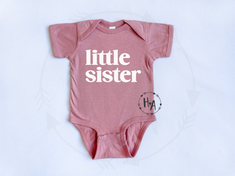 mauve pink little sister baby one-piece bodysuit. for new little sister gender reveal.