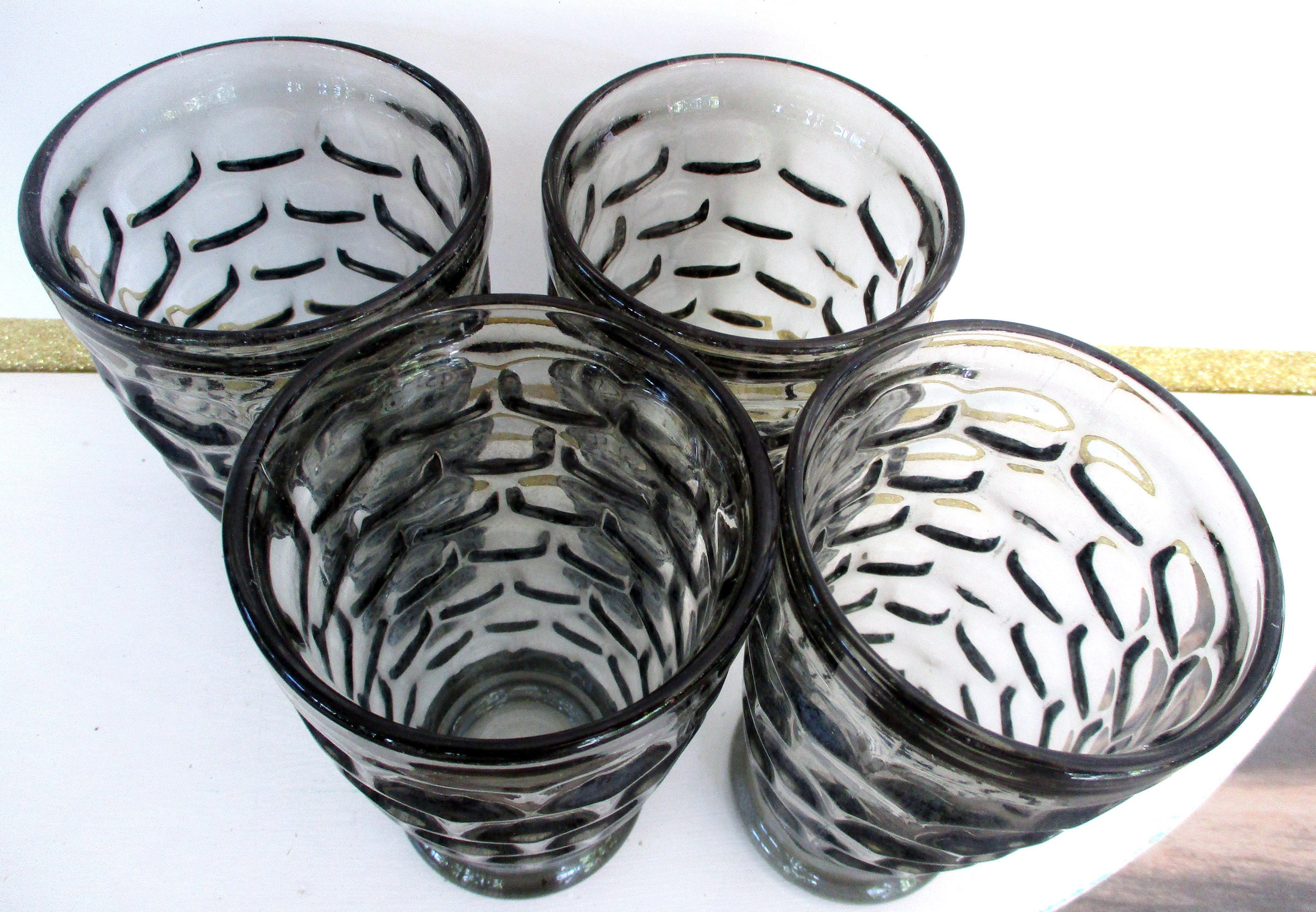 old fashioned, black hand-blown drinking glass