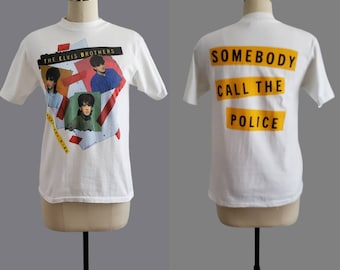 1980s Elvis Brothers Raglan T-shirt with Back Print:"Somebody Call the Police" - 80's Graphic Tee - 80s Band T-shirt Size Medium