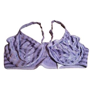 May include: A rustic wooden sign with the text "Welcome to our home" in white lettering. The sign features a distressed finish and a simple, inviting design, perfect for entryway decor.