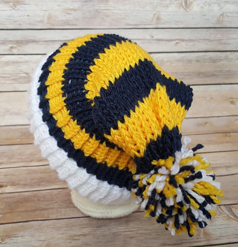 blue and yellow beanie hat