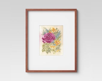 May include: A framed watercolor painting of a pink rose with yellow and blue flowers and green leaves.