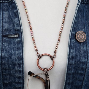 Necklace to hold reading glasses top
