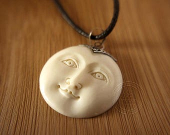 Bali Moon Spirit pendant set hand-carved and set in Sterling silver