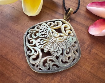 Tinted Butterfly Ocean Shell Pendant set in Sterling Silver