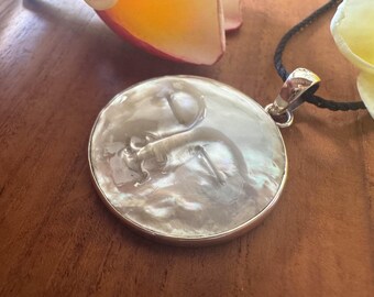 925 Sterling Moon-in-Moon pendant carved in Mother-of-Pearl, set in Sterling silver