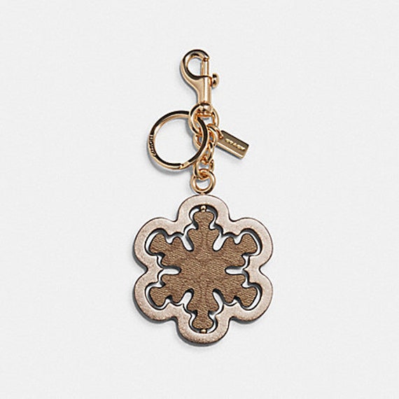 Coach Spinning Snowflake Key Chain. Free shipping