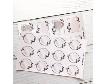 May include: Two sheets of stickers with a neutral color palette. One sheet features rectangular frames with brushstroke accents and floral sprigs. The other sheet has circular frames with floral sprigs. The stickers are on a white background.